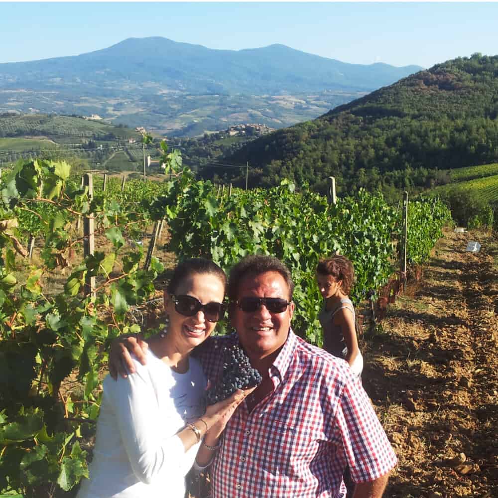 guests in a brunello di Montalcino vineyard during harvest